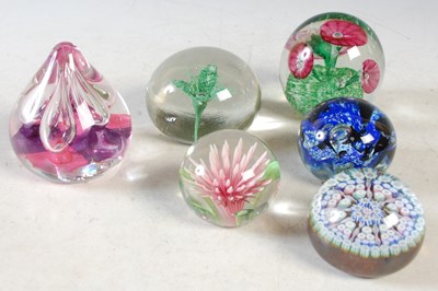 Lot 425 - A collection of six assorted paperweights.