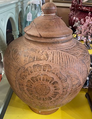 Lot 450 - A decorative terracotta pottery jar and cover...