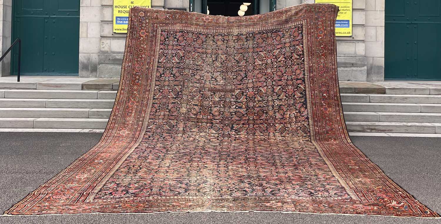 Lot 809 - A large Antique Persian carpet, late 19th/...