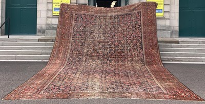 Lot 809 - A large Antique Persian carpet, late 19th/...