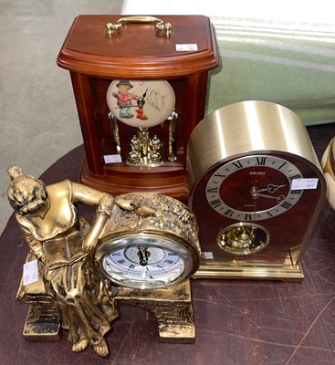 Lot 484 - A Seiko quartz mantle clock in domed case;...