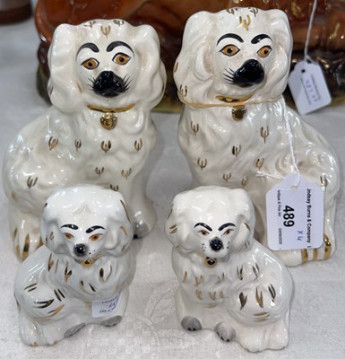 Lot 489 - Two pairs of Beswick King Charles spaniels,...
