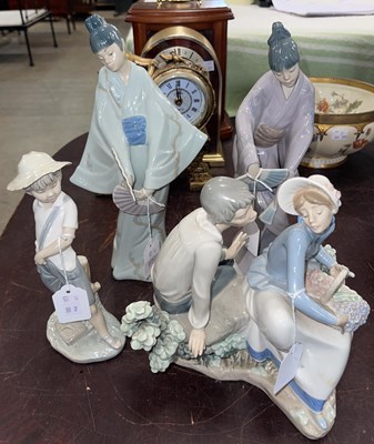 Lot 499 - Four assorted Nao figures, to include two...