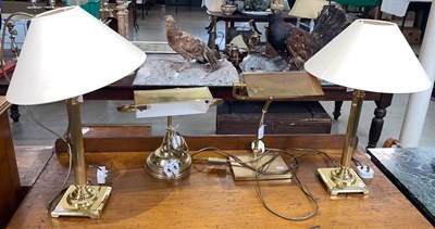 Lot 659 - A pair of brass table lamps and shades, 55cm...