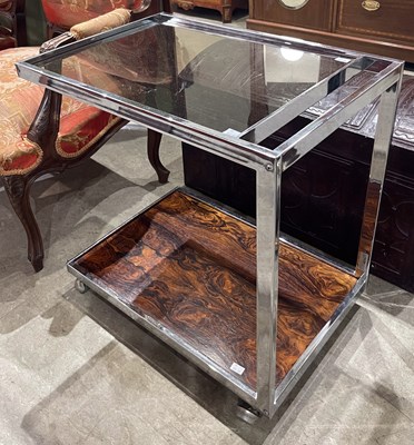 Lot 671 - Howard-Miller Ltd, a chrome, rosewood and...