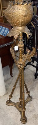 Lot 680 - A late 19th century oil lamp stand in the form...