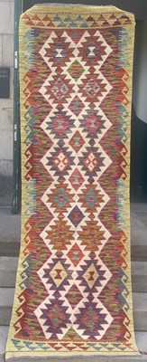 Lot 801 - A Chobi Kilim runner, the ivory coloured...