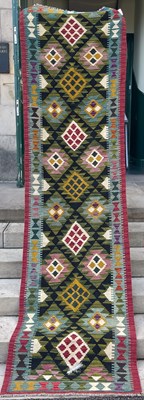 Lot 802 - A Maimana Kilim runner, the black ground...