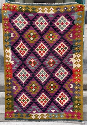 Lot 803 - A Maimana Kilim rug, the purple ground...