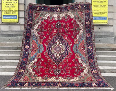 Lot 807 - A Persian Tabriz carpet, the rectangular...