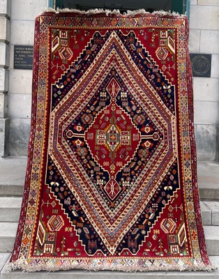 Lot 816 - A Persian Shiraz type carpet, the rectangular...
