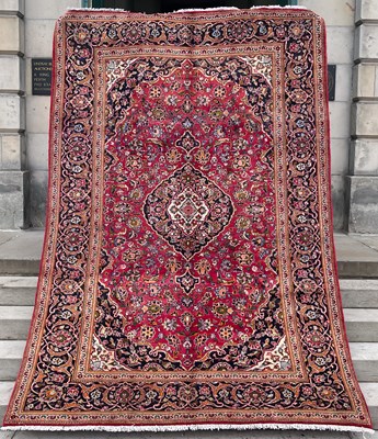 Lot 819 - A Persian Kashan carpet, the rectangular...