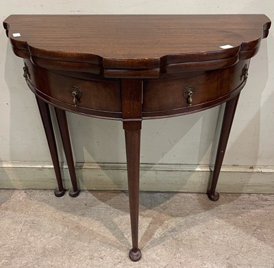 Lot 741 - A George III style mahogany demi lune card...
