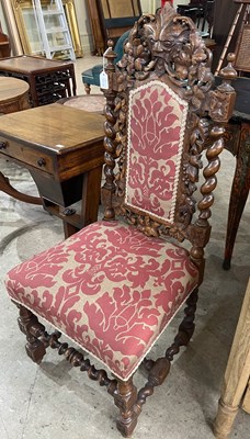 Lot 765 - An oak Jacobean style hall chair, the later...