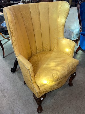 Lot 778 - An antique barrel back wing arm chair,...