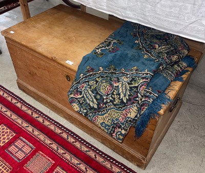Lot 753 - An antique pine kist, the hinged cover opening...