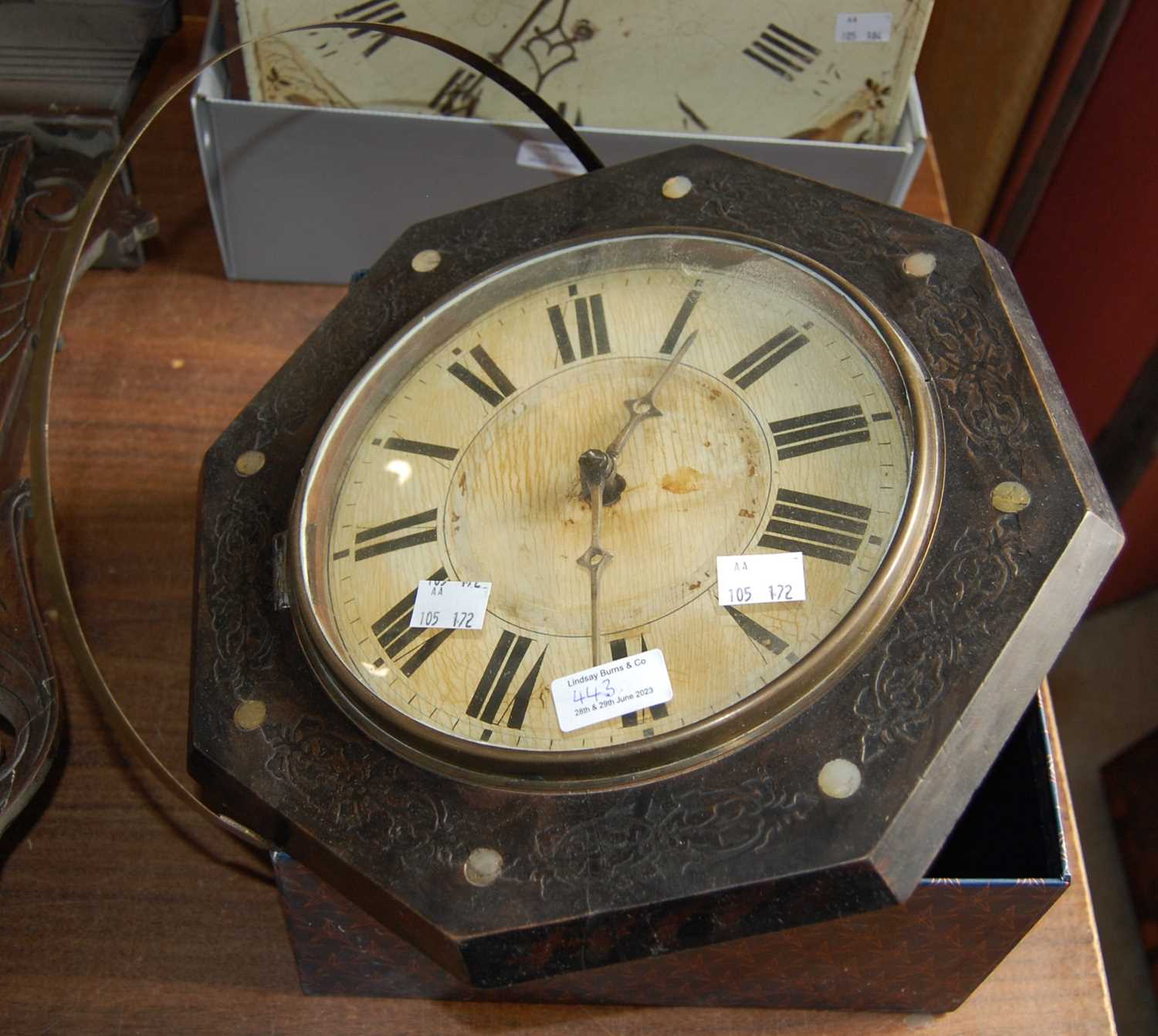 Lot 443 - An octagonal Wag on The Wall clock with mother...