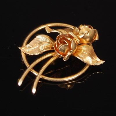 Lot 304 - A yellow metal double rose brooch, stamped...