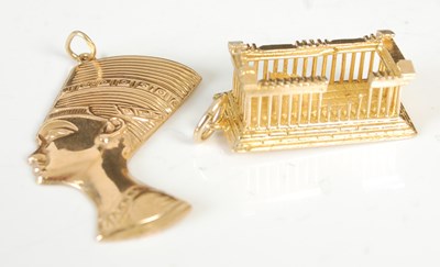 Lot 304J - A yellow metal pendant in the form of the...