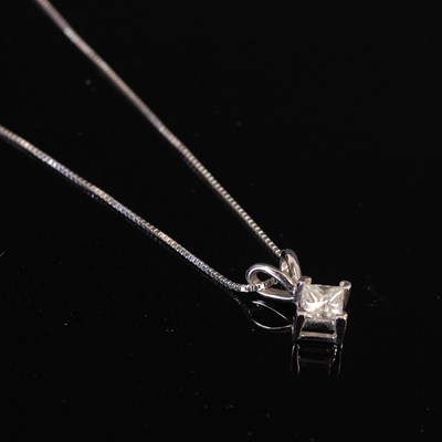 Lot 305B - A white metal mounted princess cut single...