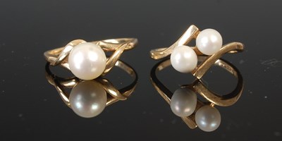 Lot 305F - A 9ct gold and two pearl set ring, size O;...