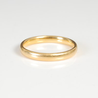 Lot 306 - A 22ct gold wedding ring, size O, 3.2 grams.