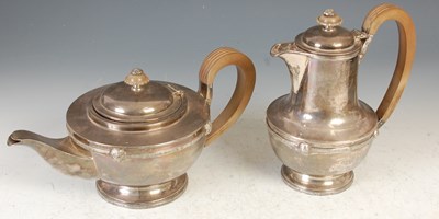 Lot 320 - A Sheffield silver teapot and matching hot...
