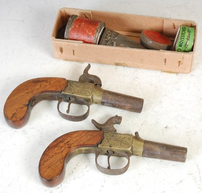 Lot 323 - Two antique percussion cap muff pistols...