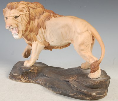 Lot 11 - A Beswick matt glazed model of a male lion, 21....
