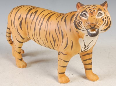 Lot 13 - A Beswick matt glazed figure of a tiger, 19cm...