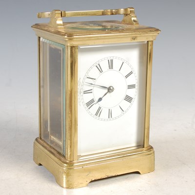 Lot 22 - An early 20th century brass cased carriage...