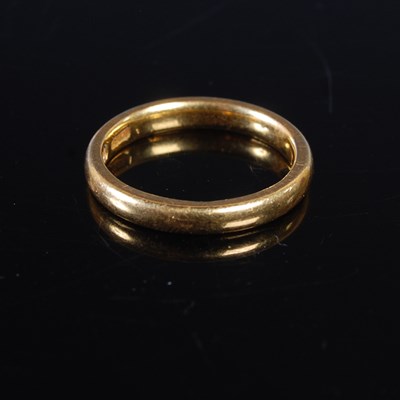 Lot 24 - A 22ct gold wedding ring, size L, 4.5 grams.