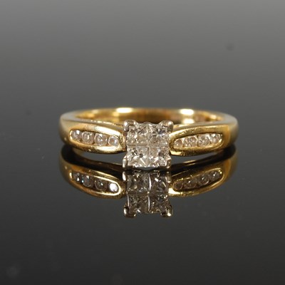 Lot 29 - An 18ct gold and diamond dress ring, centred...