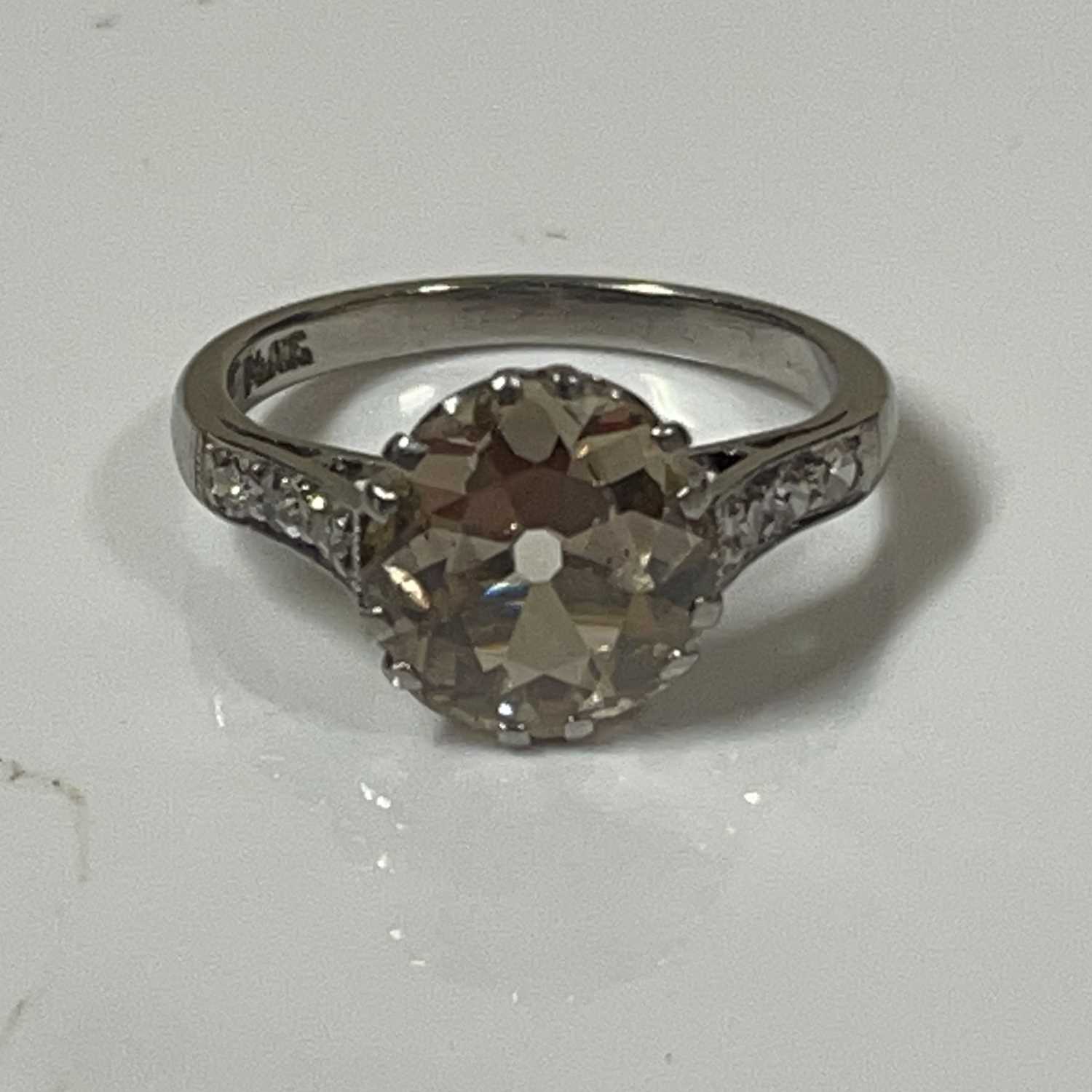 Lot 36 - A white metal diamond solitaire dress ring,...