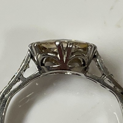 Lot 36 - A white metal diamond solitaire dress ring,...