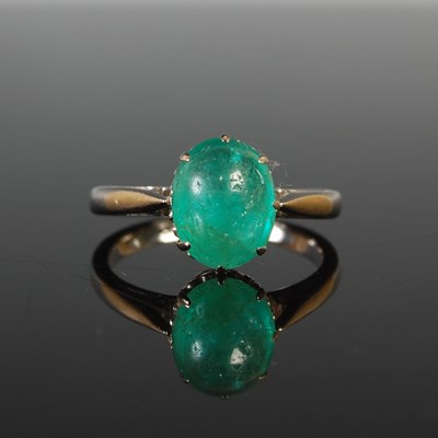 Lot 38 - A white metal single stone emerald cabochon...