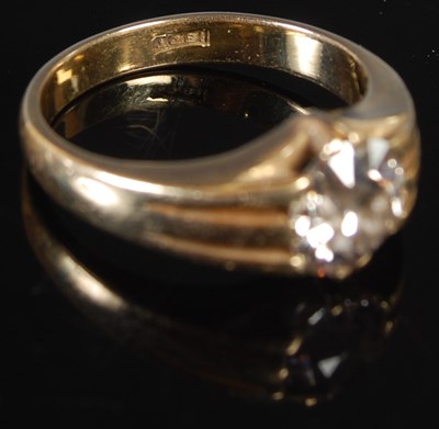 Lot 39 - A yellow metal single stone diamond ring, set...