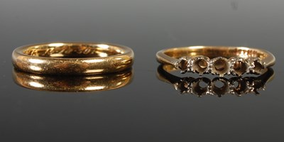 Lot 44 - An 18ct gold wedding ring, size N, 4.1 grams;...