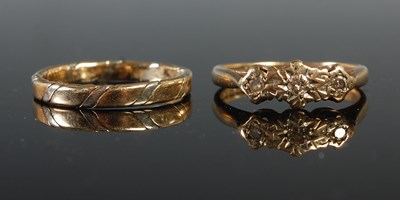 Lot 47 - A 9ct gold and three stone diamond chip dress...