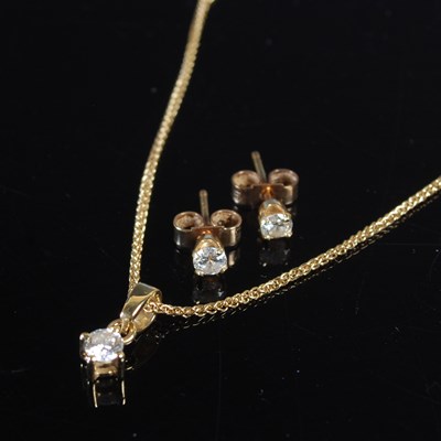 Lot 52 - An 18ct gold necklace suspending 18ct gold...