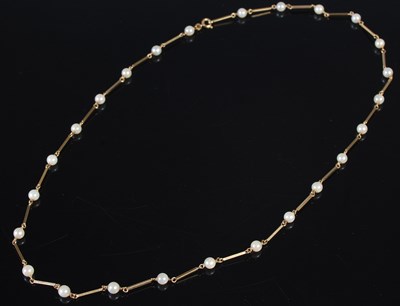 Lot 71 - An 18ct gold and pearl necklace, stamped '750',...