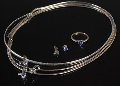 Lot 84 - A suite of Tanzanite International white metal...