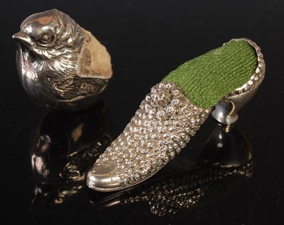 Lot 113A - A novelty silver pin cushion in the form of a...