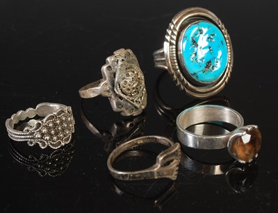 Lot 157 - A vintage Navajo silver and turquoise ring by...