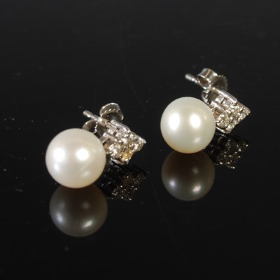 Lot 167 - A pair of 9ct white gold, diamond and pearl...