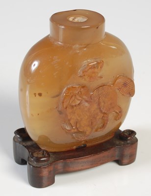 Lot 149 - An antique Chinese carved agate snuff bottle,...