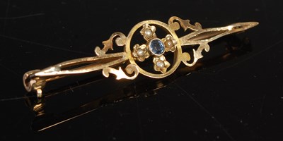 Lot 186 - A yellow metal, split pearl and blue gem stone...