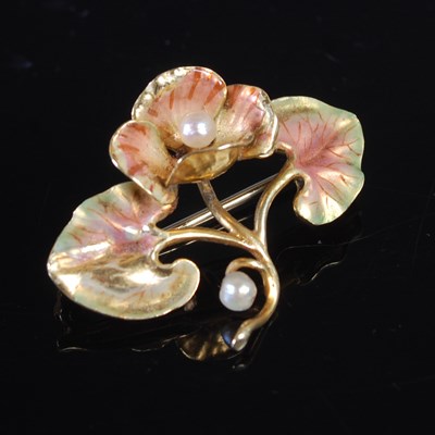 Lot 187 - A yellow metal and pearl set flower brooch,...