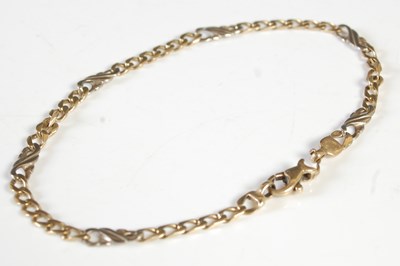 Lot 197 - A 9ct yellow and white gold bracelet, 4.1 grams.