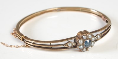 Lot 209 - A yellow metal, split pearl and blue gem stone...